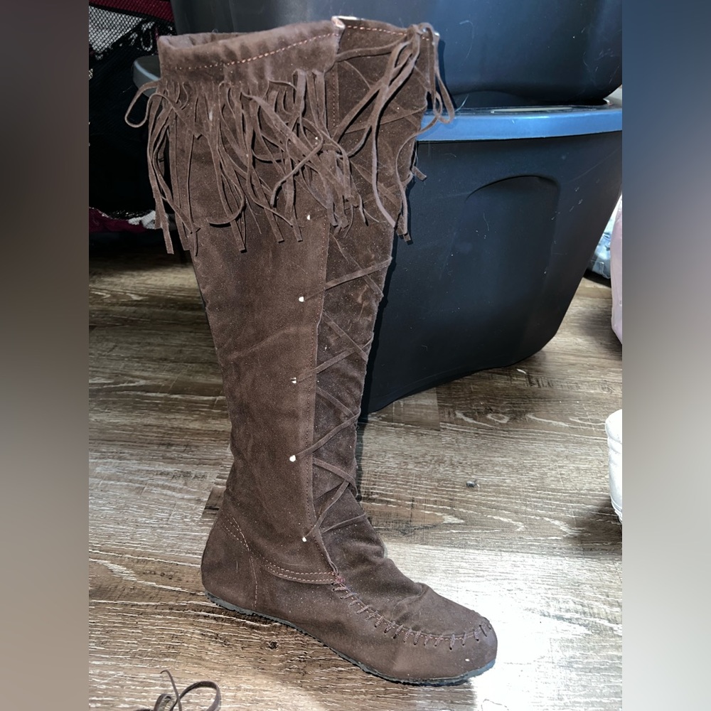 Tall, moccasin, knee-high boots